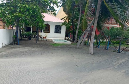 Poneloya House | Entire house, right on the beach, with a small pool.