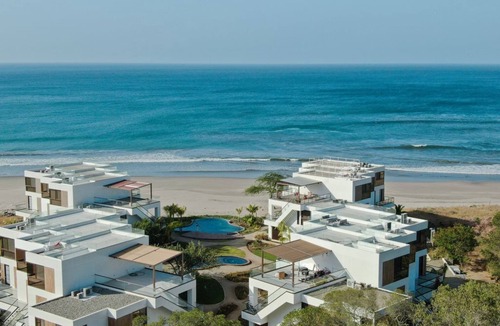 Playa Colorado Condo | VILLA CORONADO: Brand new, exquisitely decorated two story beach front condo.