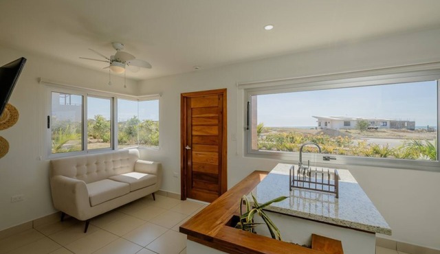 Breezy 2BR Beach House with Resort Amenities