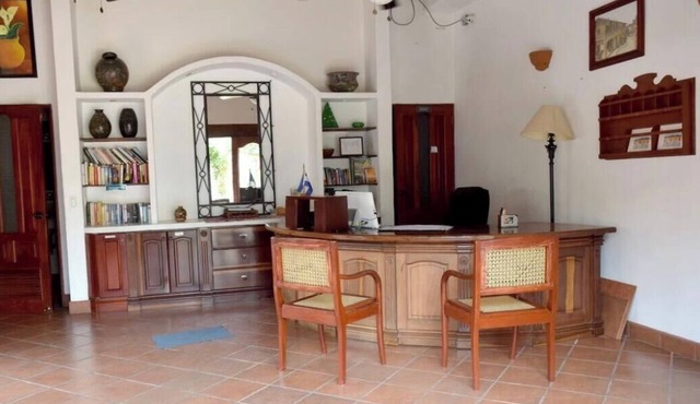 Cozy 2-bedroom condo in historic Granada with air conditioning and pool.