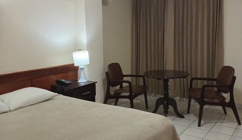 Basic Double Room, 1 Queen Bed, Courtyard View