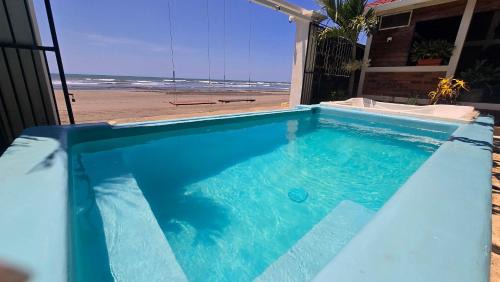 Pochomil House | Balcony Bedroom Suite w Romantic Sunsets - AC - Pool