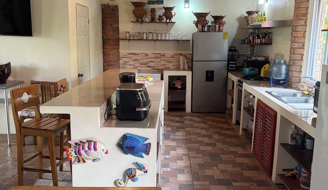 Serene 2-bedroom house, beautiful swimming pool & gardens in colonial Catarina in Catarina